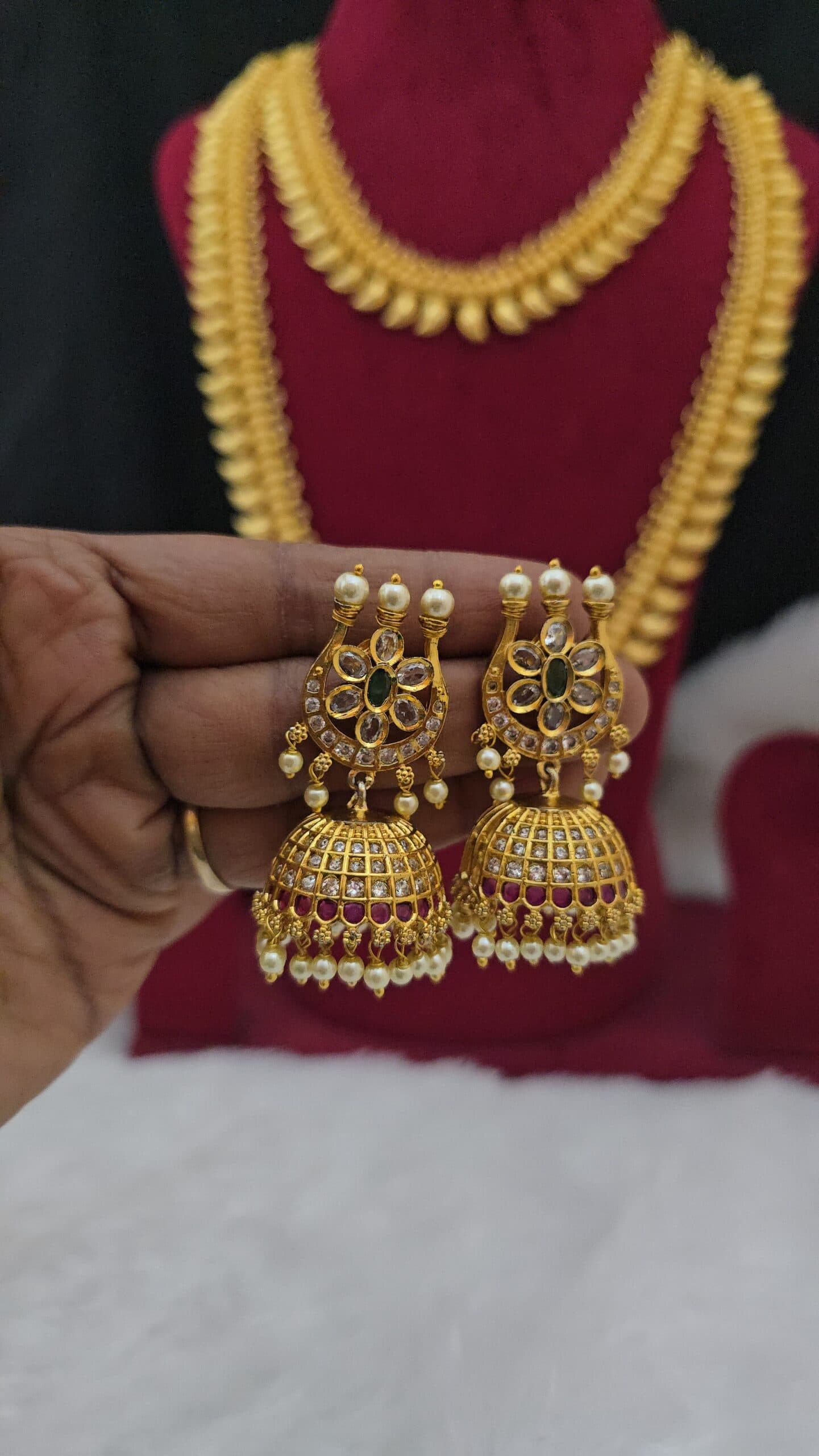Premium quality kundan stone jhumka comes antique finish