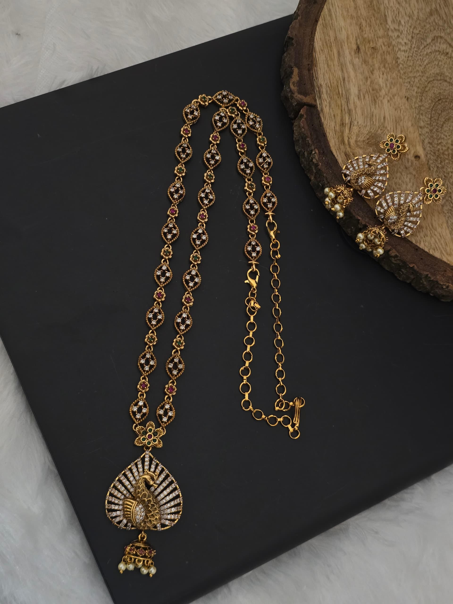 Premium matt ad stone peacock haram with earings
