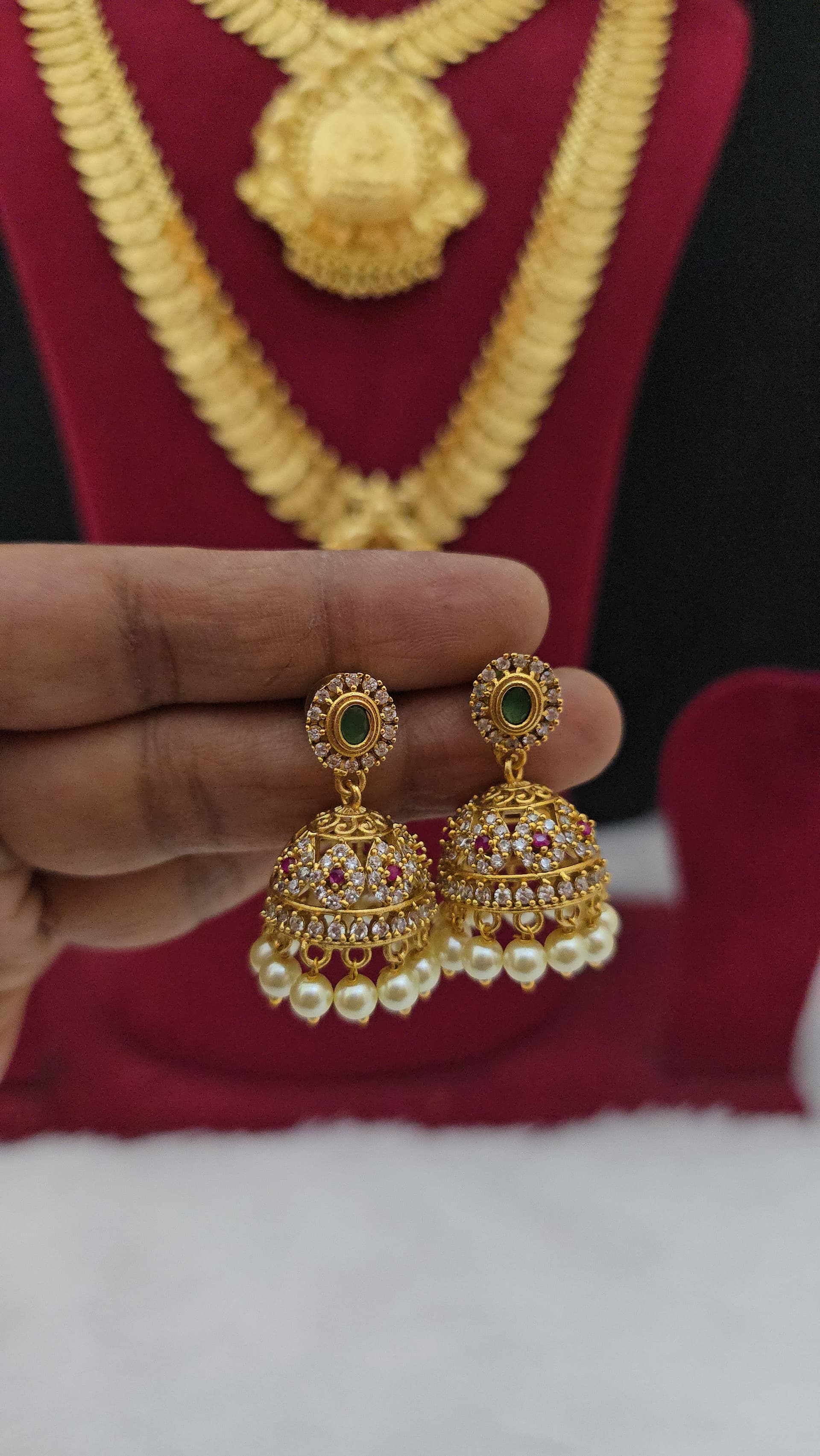 Premium matt ad stone jhumka with pearl drops