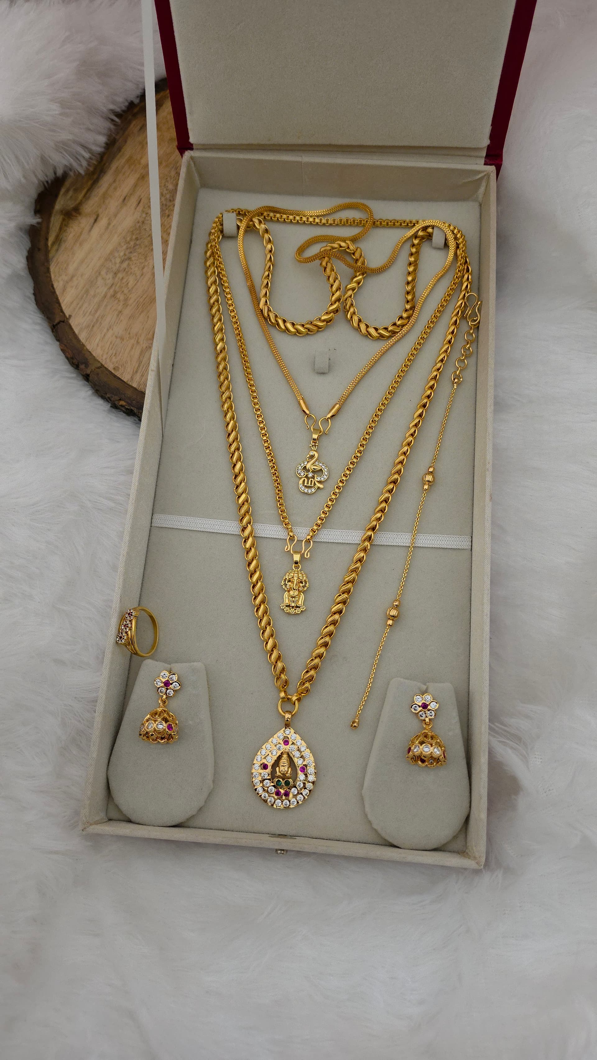 Premium impon lakshmi combo comes stone work including (inches dollar chain ,28 inche dollar chain ,18 inches dollar chain,1 jhumka ,1 ring ,1 bracelet,)