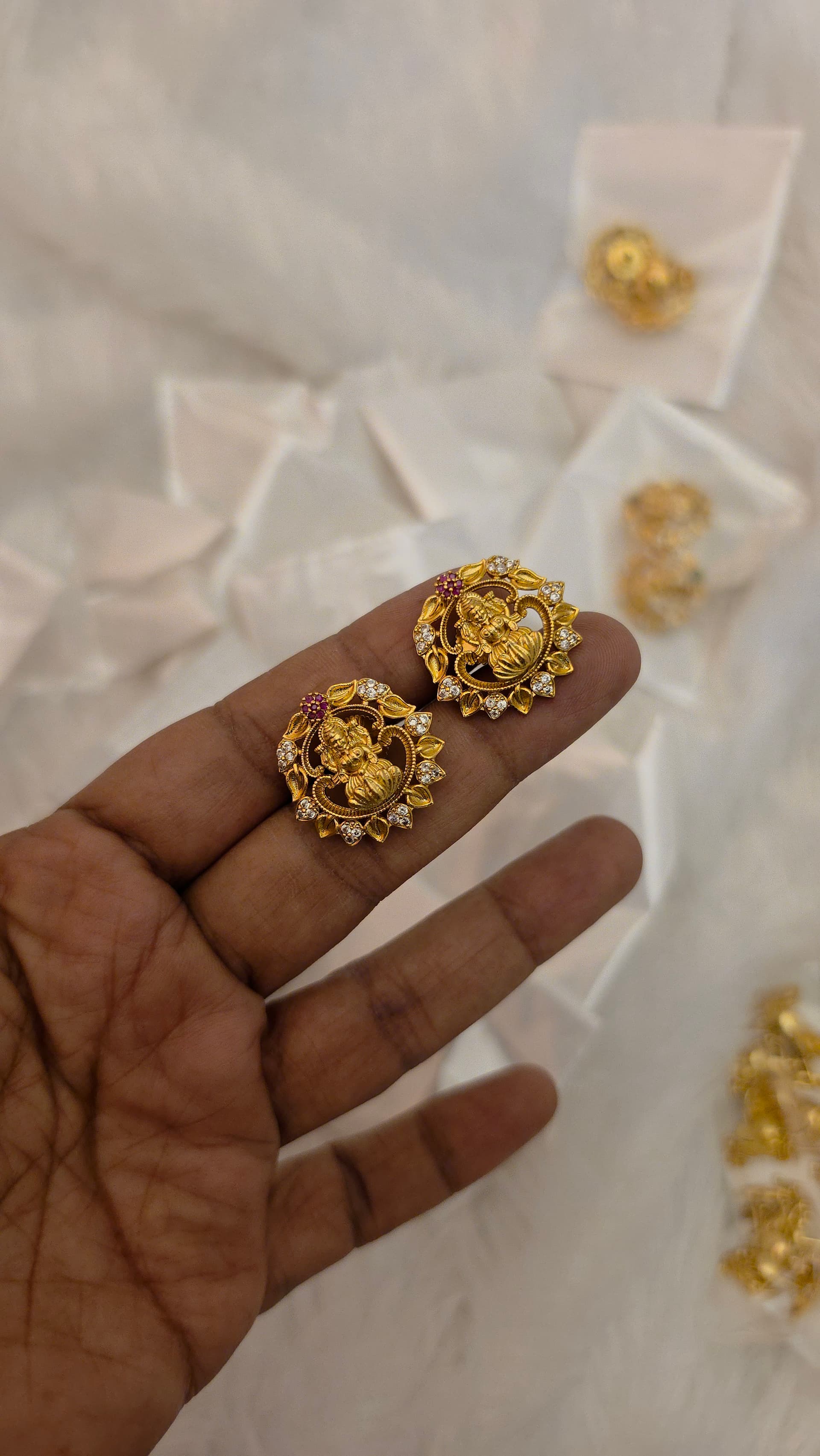 Premium quality  antique lakshmi stud comes real gold tone