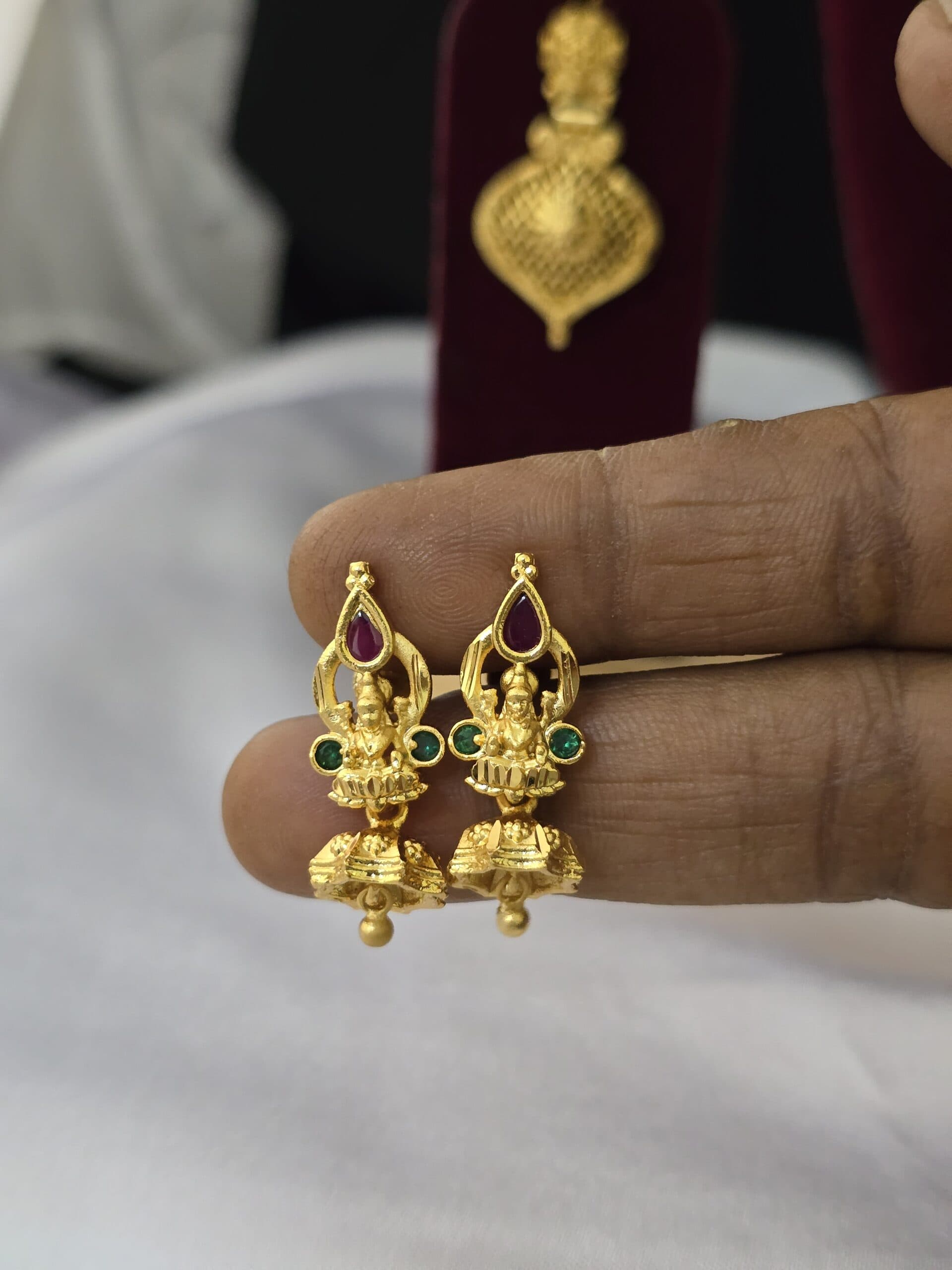 Foaming ad gold tone nagas jhumka