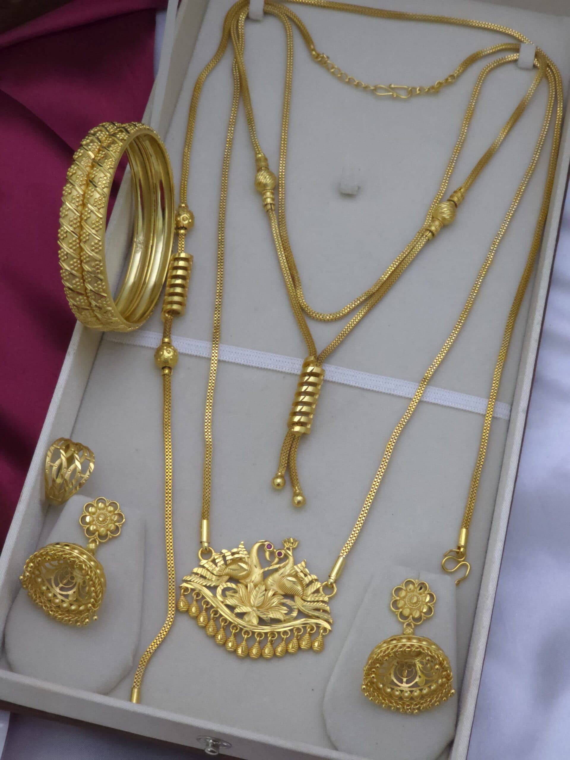 Premium foaming combo including mugappu chain, short spring chain, bangle ,ring ,earing