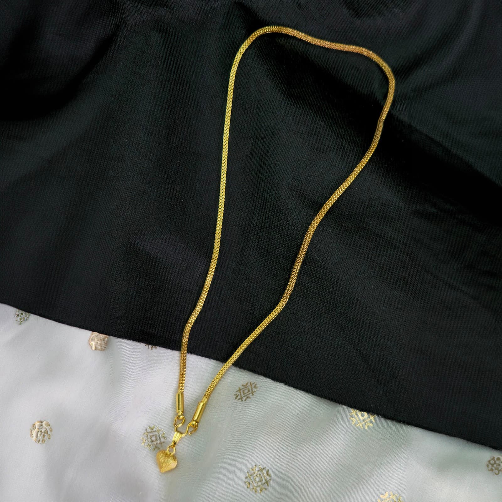 Micro heart dollar chain