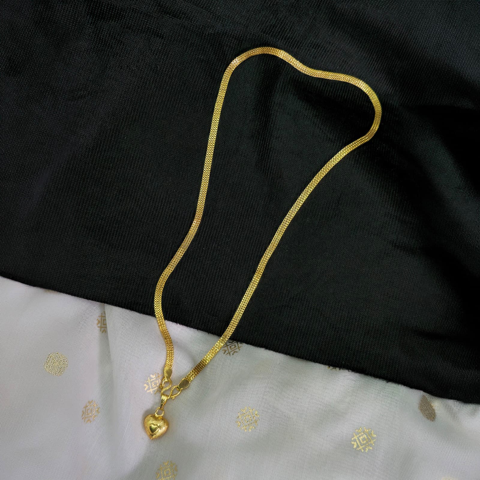 Micro heart dollar chain